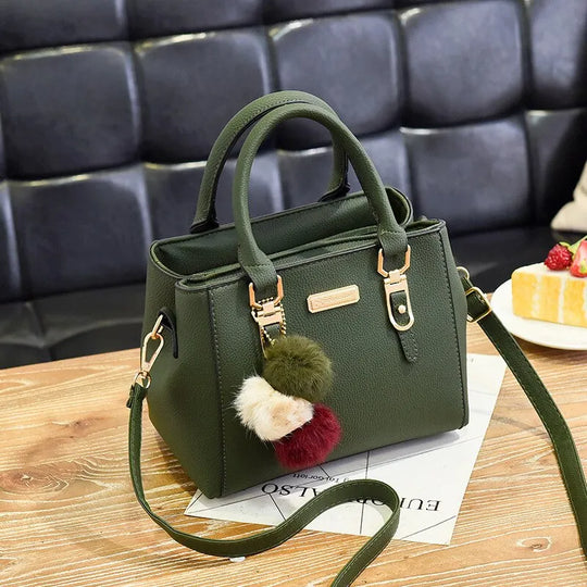Damenhandtasche aus Leder mit Quaste